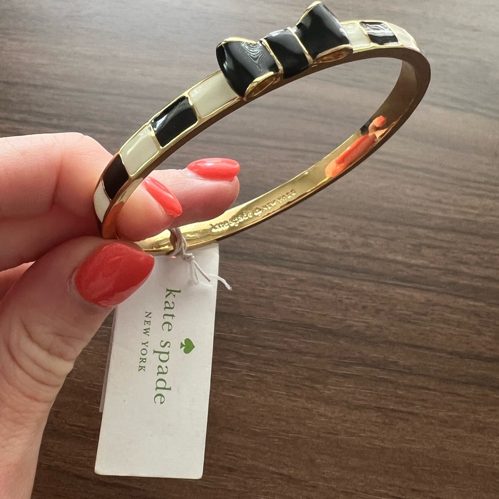 Kate spade take a bow cream and black bangle